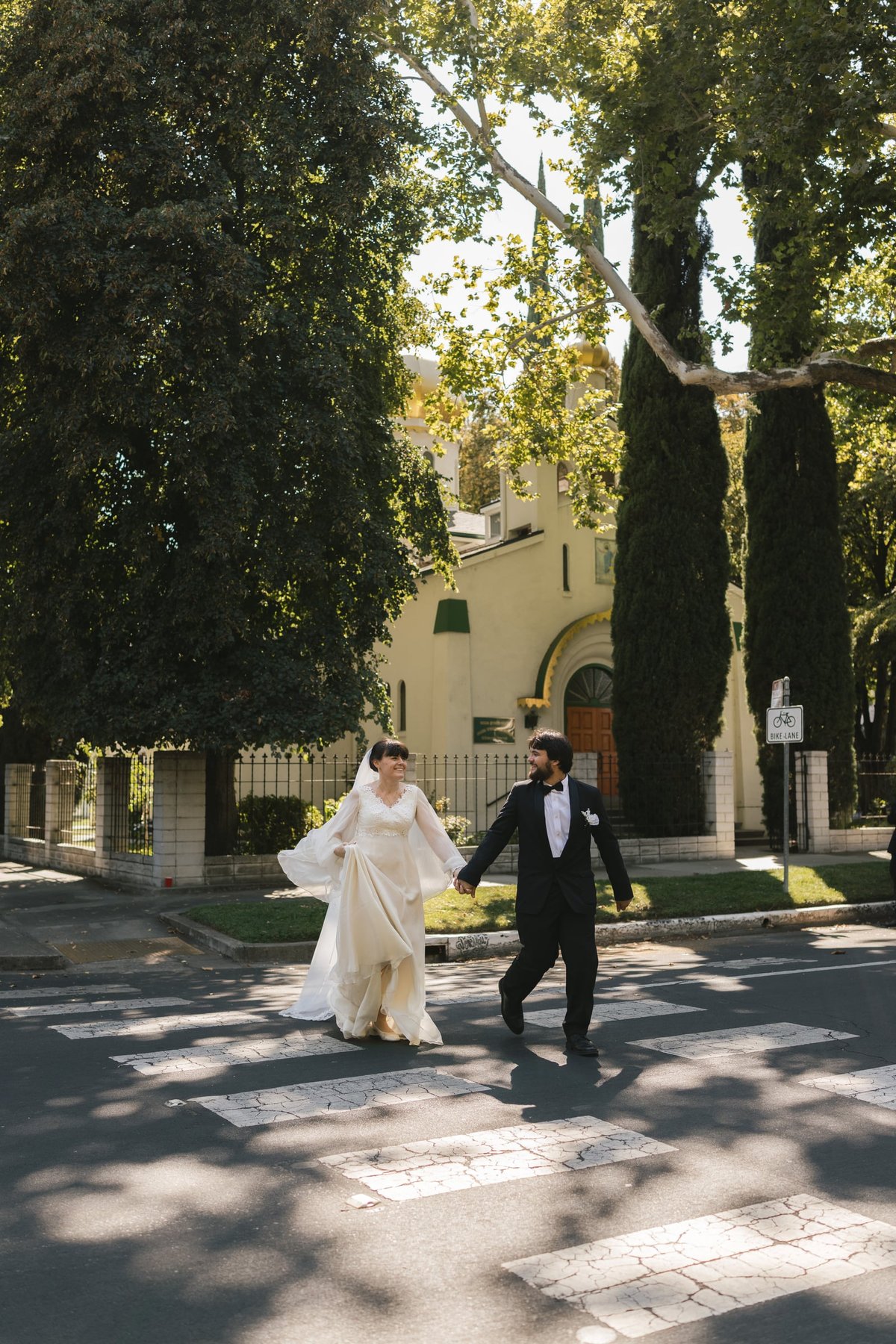 A newly married couple outside the church after their wedding