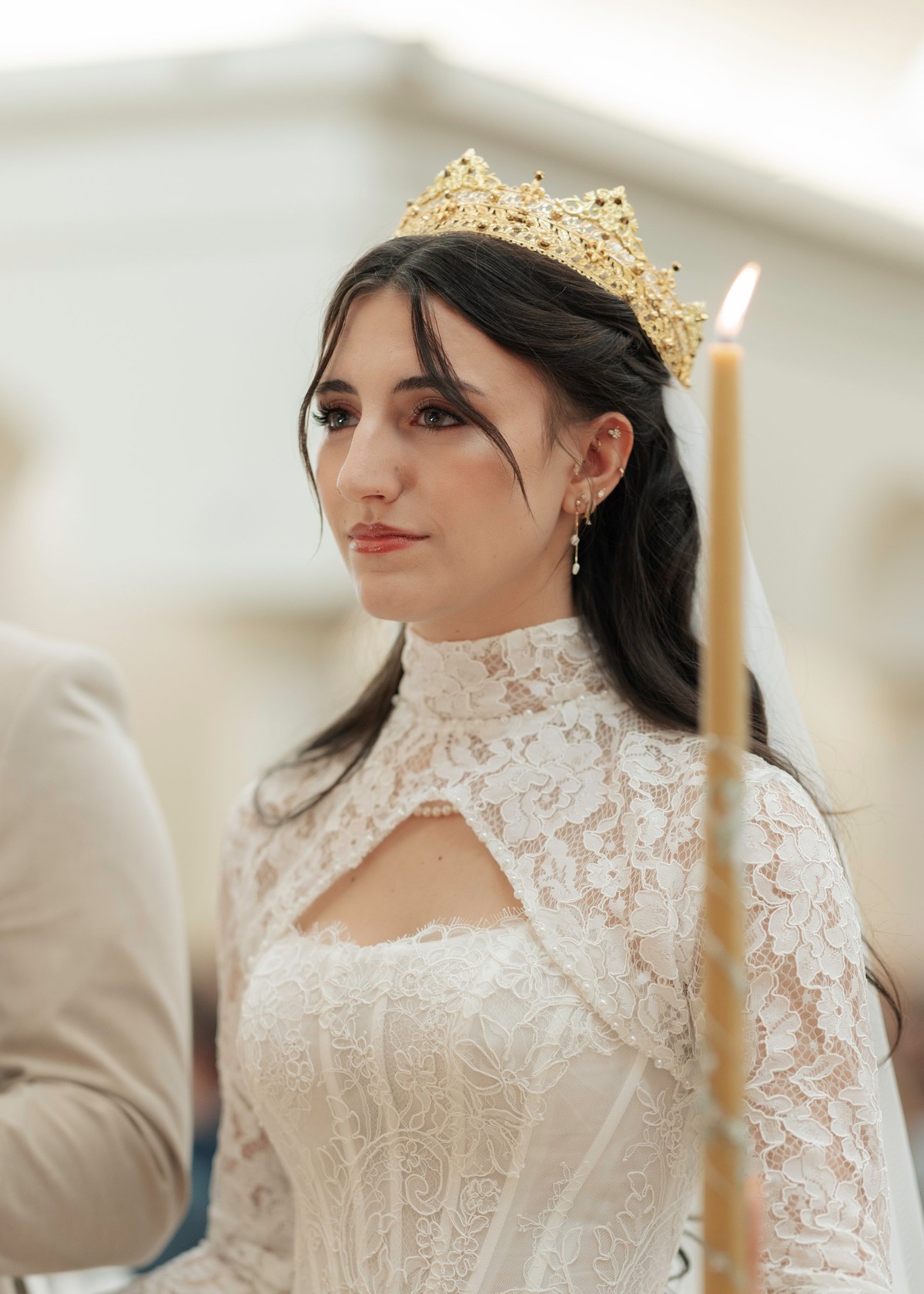 The bride wears her wedding crown during the ceremony