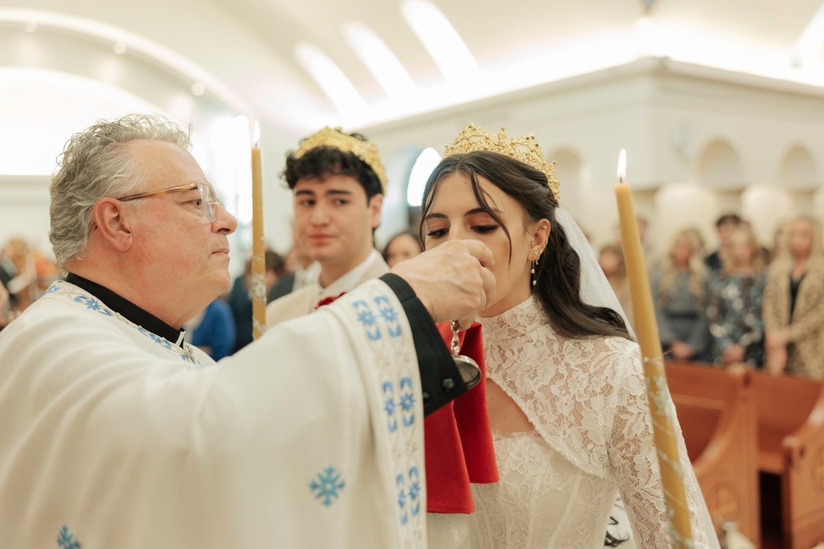 The bride drinks from the common cup