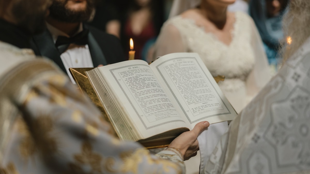 An open service book lies on the tetrapod during the wedding readings