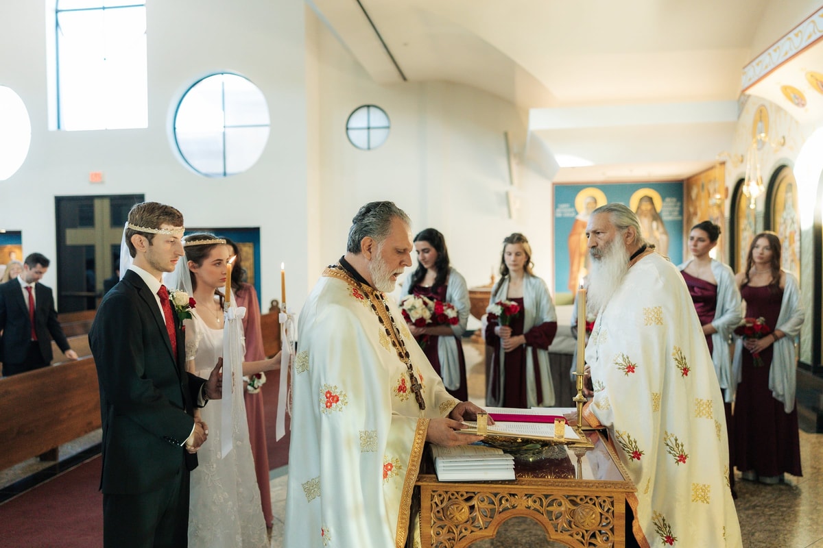 The clergy prepare the next part of the marriage rite at the tetrapod