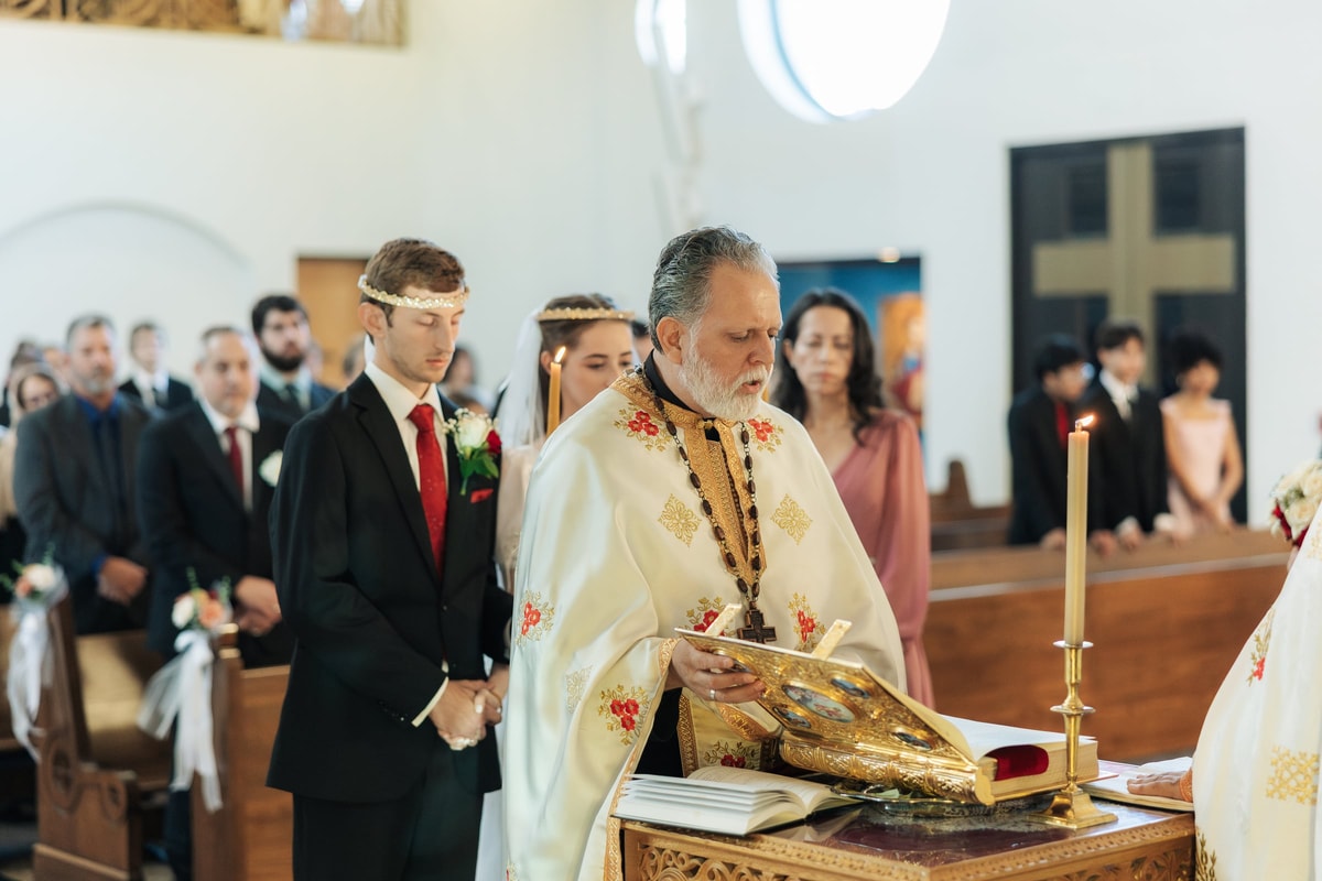 The clergy prepare the next part of the marriage rite at the tetrapod