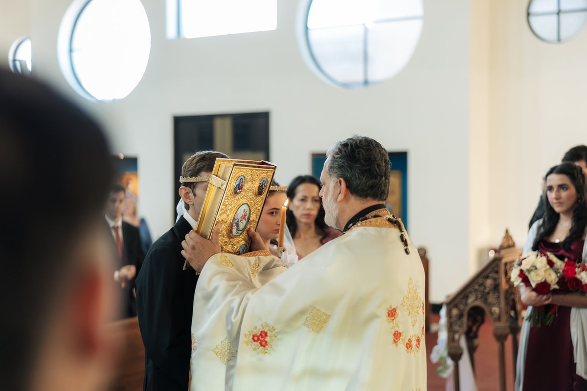 The bride kisses the Gospel book