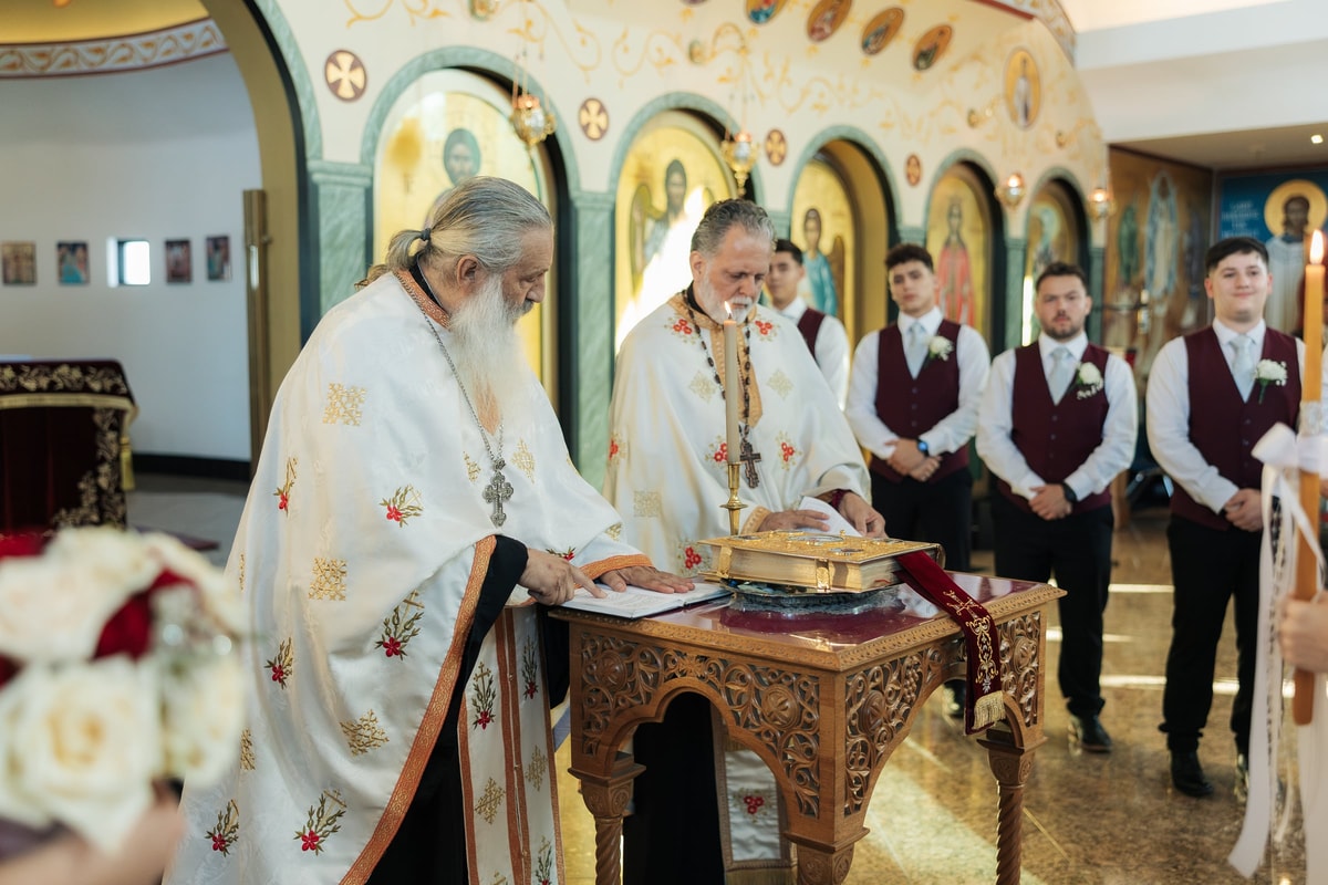 A priest prepares the common cup at the tetrapod