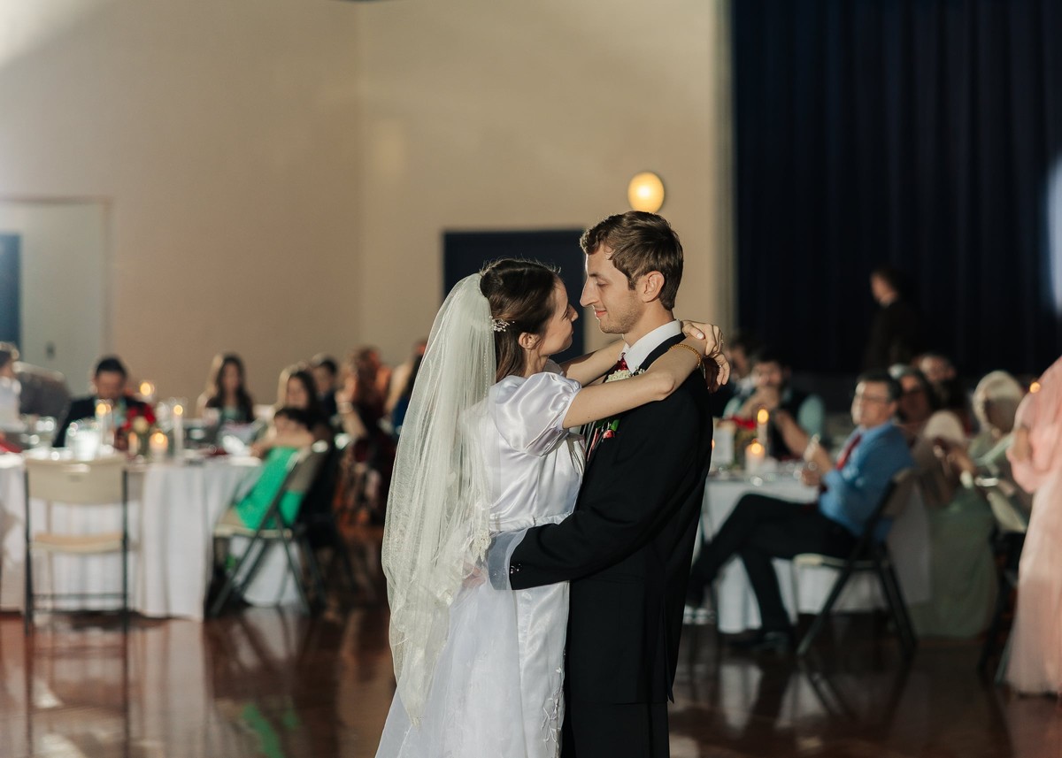 The bride and groom share their first dance