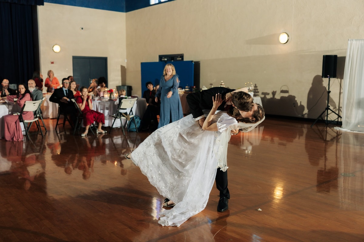 The bride and groom dance together at their reception